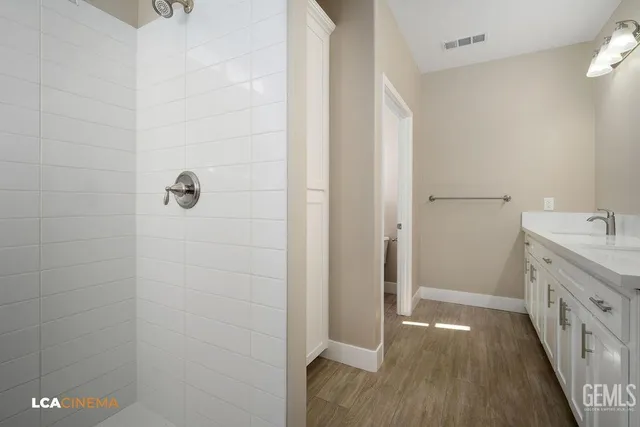 a view of a kitchen with a sink