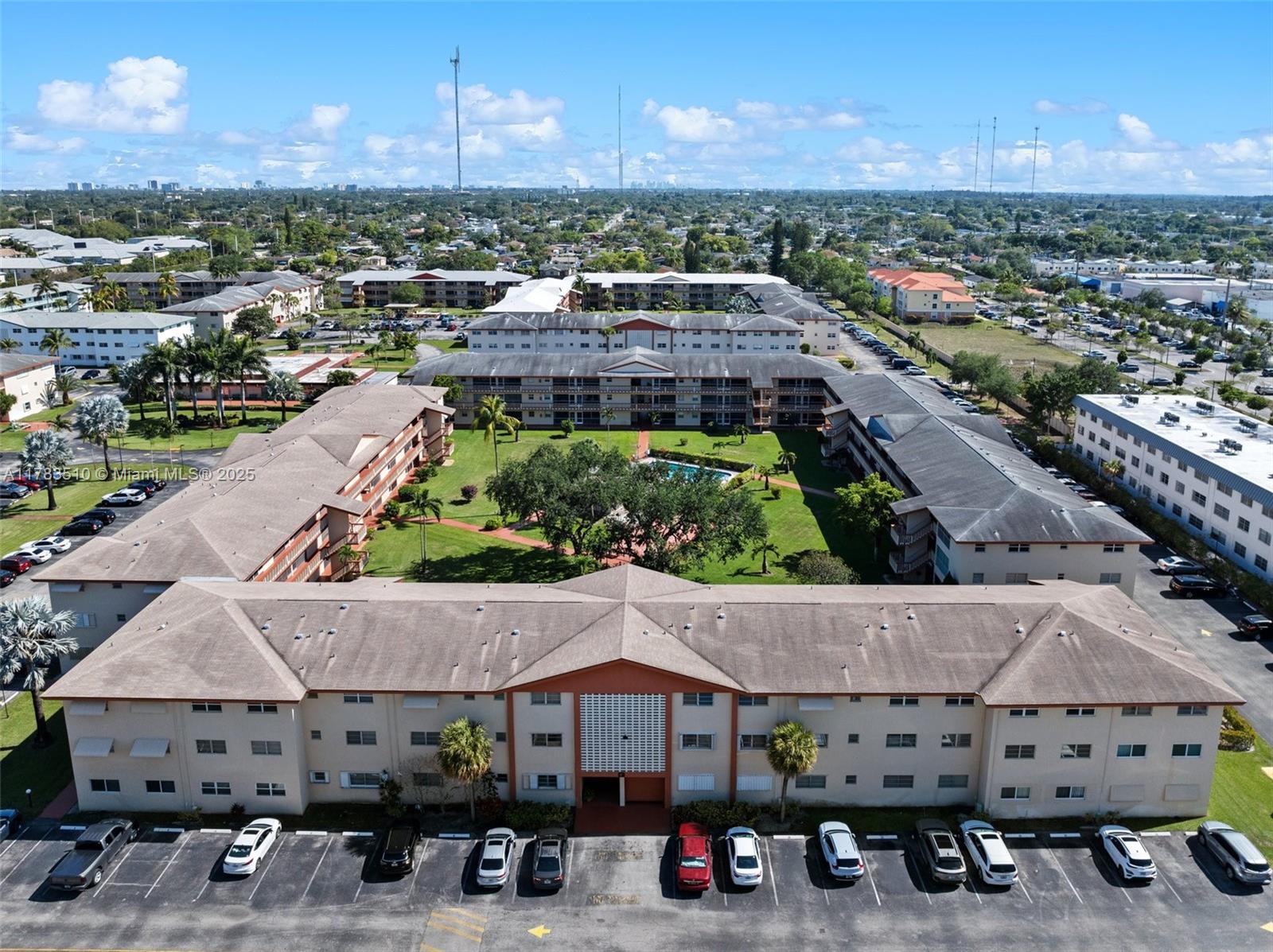 5300 Washington Street, Unit G323 Hollywood, FL 33021 - Photo 3 of 34 a terrace with outdoor seating and city view