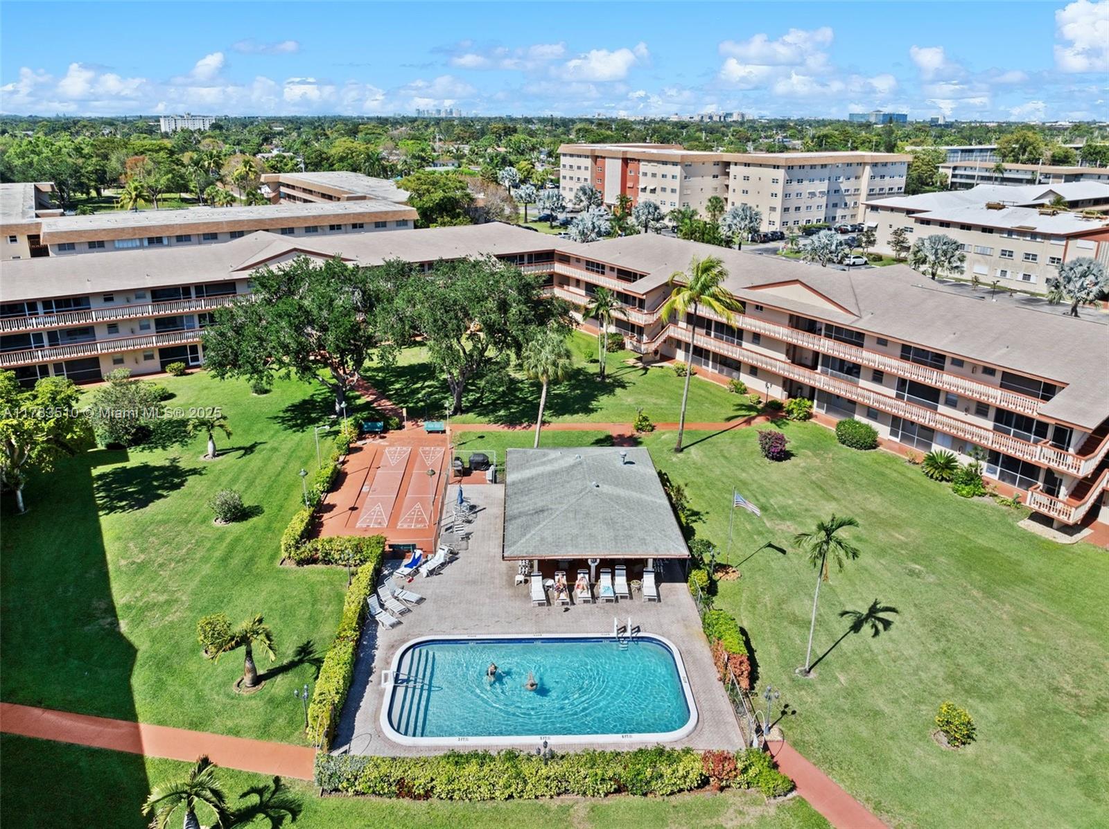 5300 Washington Street, Unit G323 Hollywood, FL 33021 - Photo 33 of 34 an aerial view of swimming pool and a yard