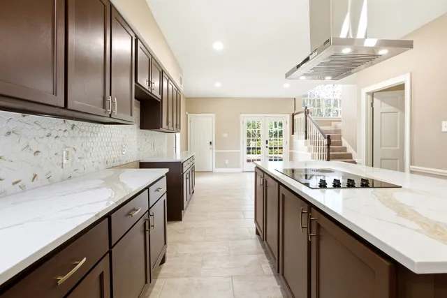 a kitchen with stainless steel appliances granite countertop counter space cabinets and a sink