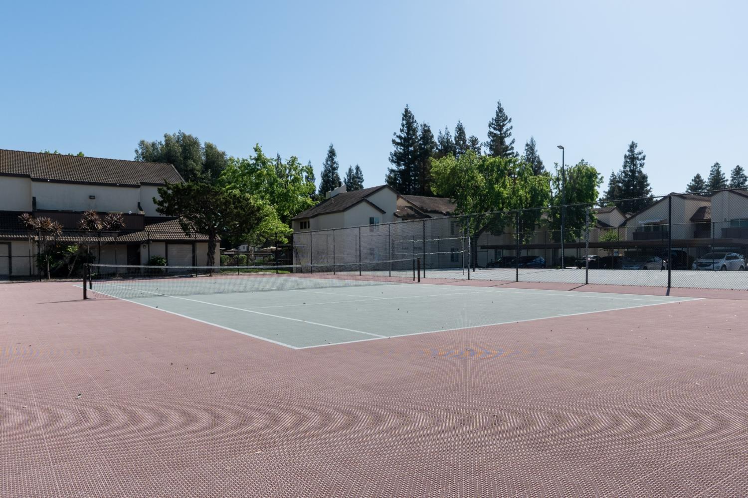 3701 Colonial Drive, Unit 89 Modesto, CA 95356 - Photo 11 of 20 a view of a tennis court