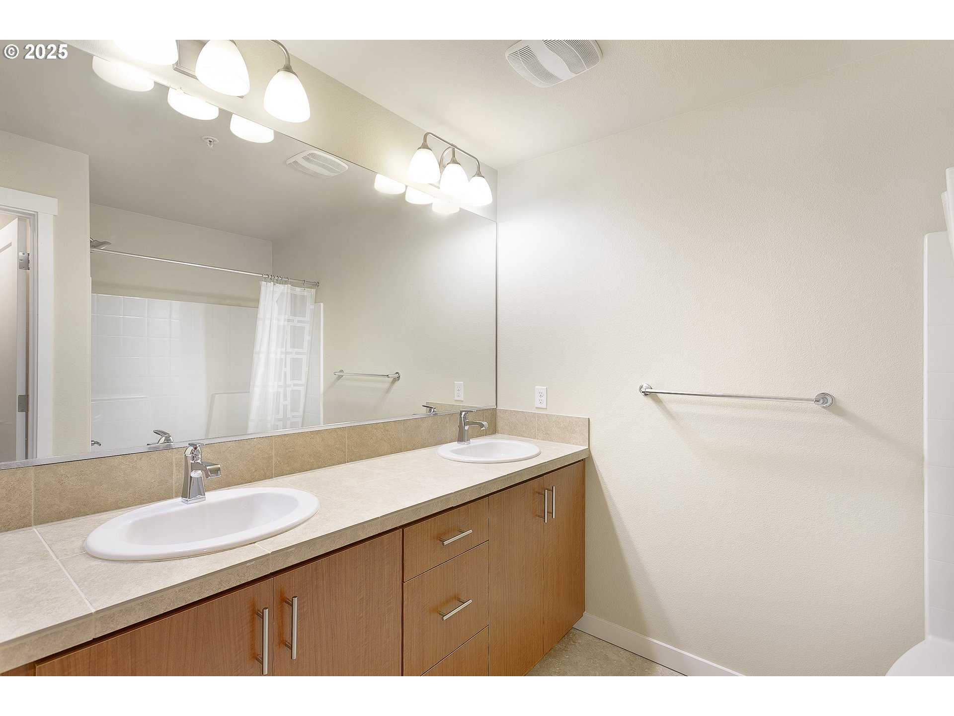 16449 Northwest Chadwick Way, Unit 201 Portland, OR 97229 - Photo 13 of 22 Primary Bedroom