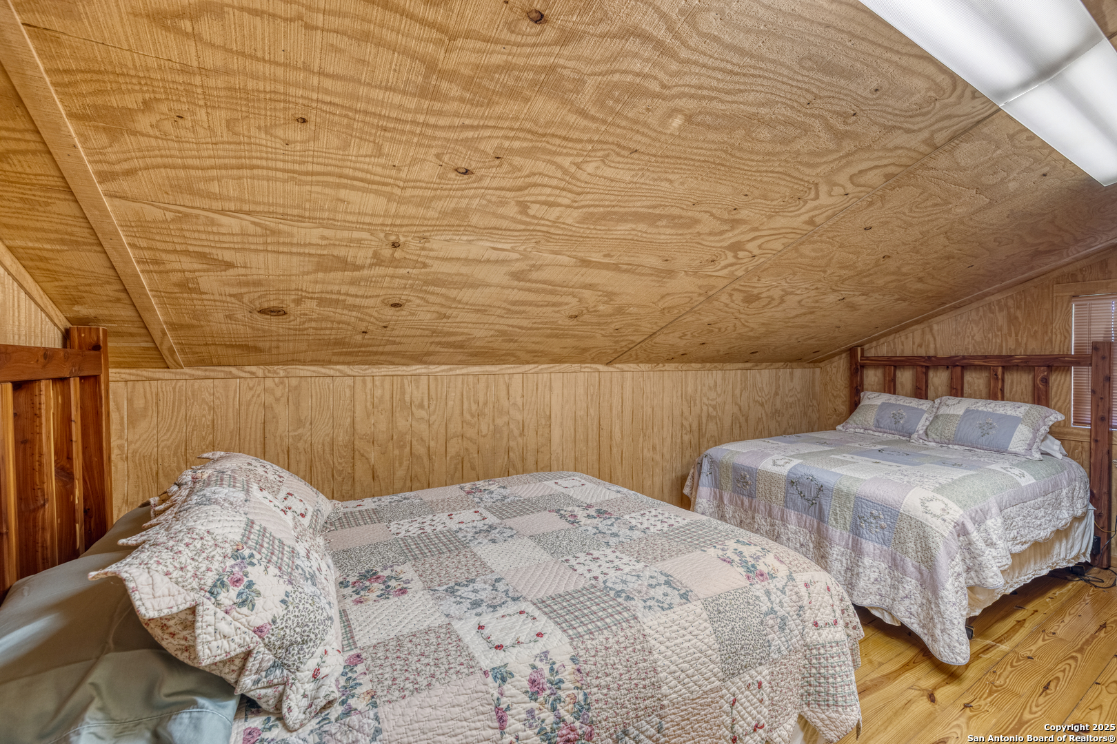 4983 Ranch Road 1051 Uvalde, TX 78801 - Photo 40 of 72 a bedroom with double bed and a bed