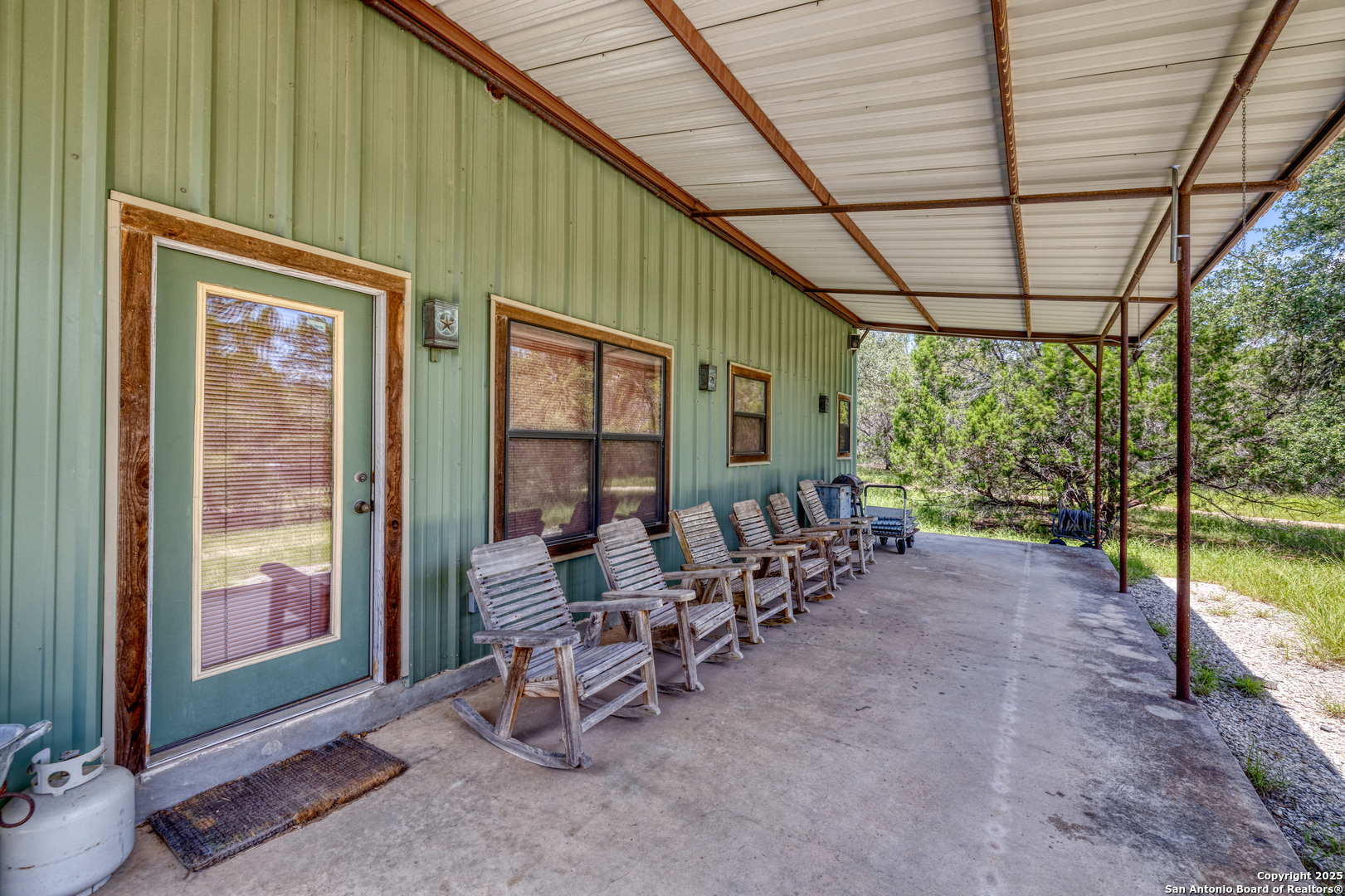 4983 Ranch Road 1051 Uvalde, TX 78801 - Photo 44 of 72 a view of a chairs and table in patio