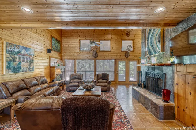 a balcony with furniture and a potted plant