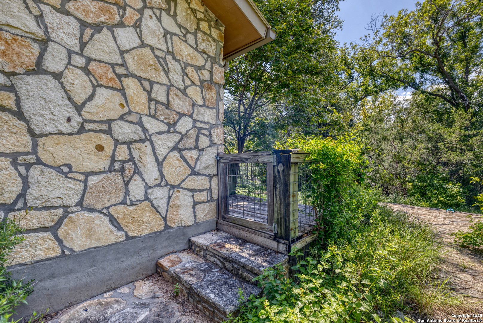 4983 Ranch Road 1051 Uvalde, TX 78801 - Photo 56 of 72 a view of a bench in a garden
