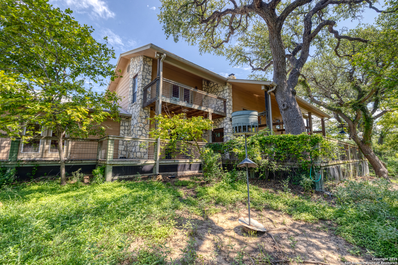 4983 Ranch Road 1051 Uvalde, TX 78801 - Photo 57 of 72 a front view of a house with a yard