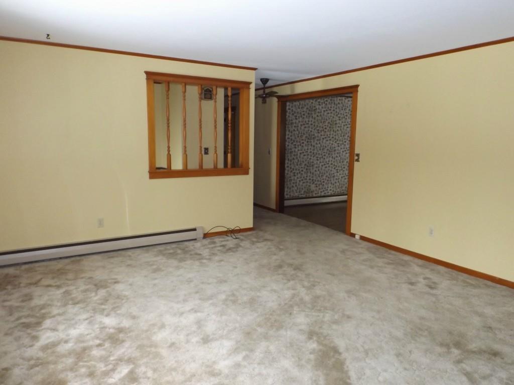 234 Kidder Hill Road Holden, ME 04429 - Photo 5 of 35 Living room facing kitchen/entry.
