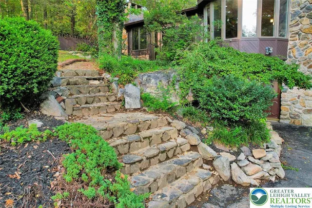 a view of a garden with a building