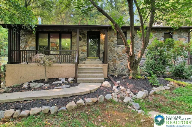 a view of a living room with furniture