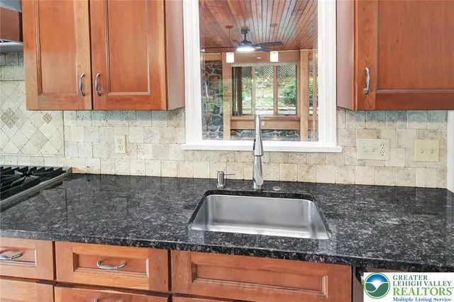 a view of an empty room with a balcony