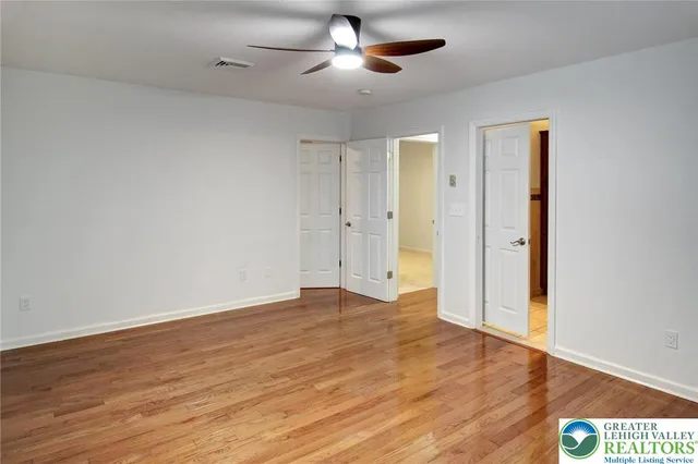 a bathroom with a toilet and a sink