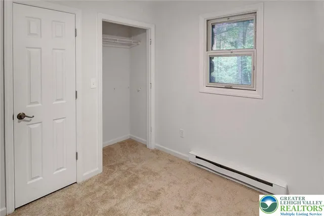 a view of a closet with storage
