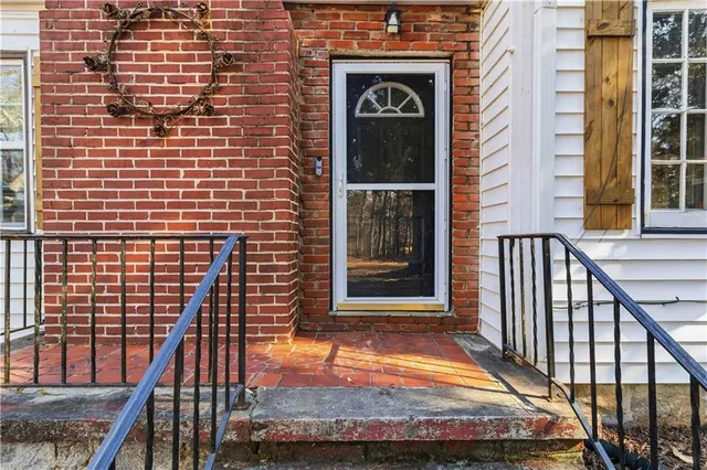 a view of front door of house with street