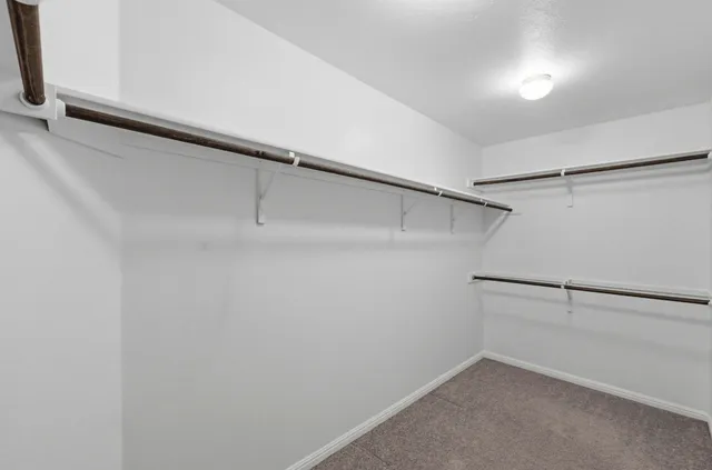 a view of a room with racks on the wall