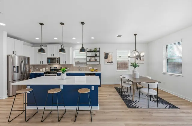 a view of a dining room with furniture