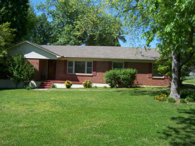 203 Jackson Heights Road Columbia, TN 38401 - Photo 1 of 15 Front View of 203 Jackson Heights Rd. All brick home on level lot with established trees. Approximately .40 / acre.