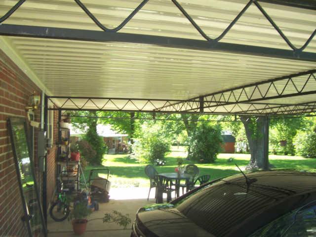 203 Jackson Heights Road Columbia, TN 38401 - Photo 7 of 15 Very large carport on back with relatively new top. Plenty of space to park your car and have other space for enjoying afternoon cookouts or leisurely enjoyment and morning coffee if you like.