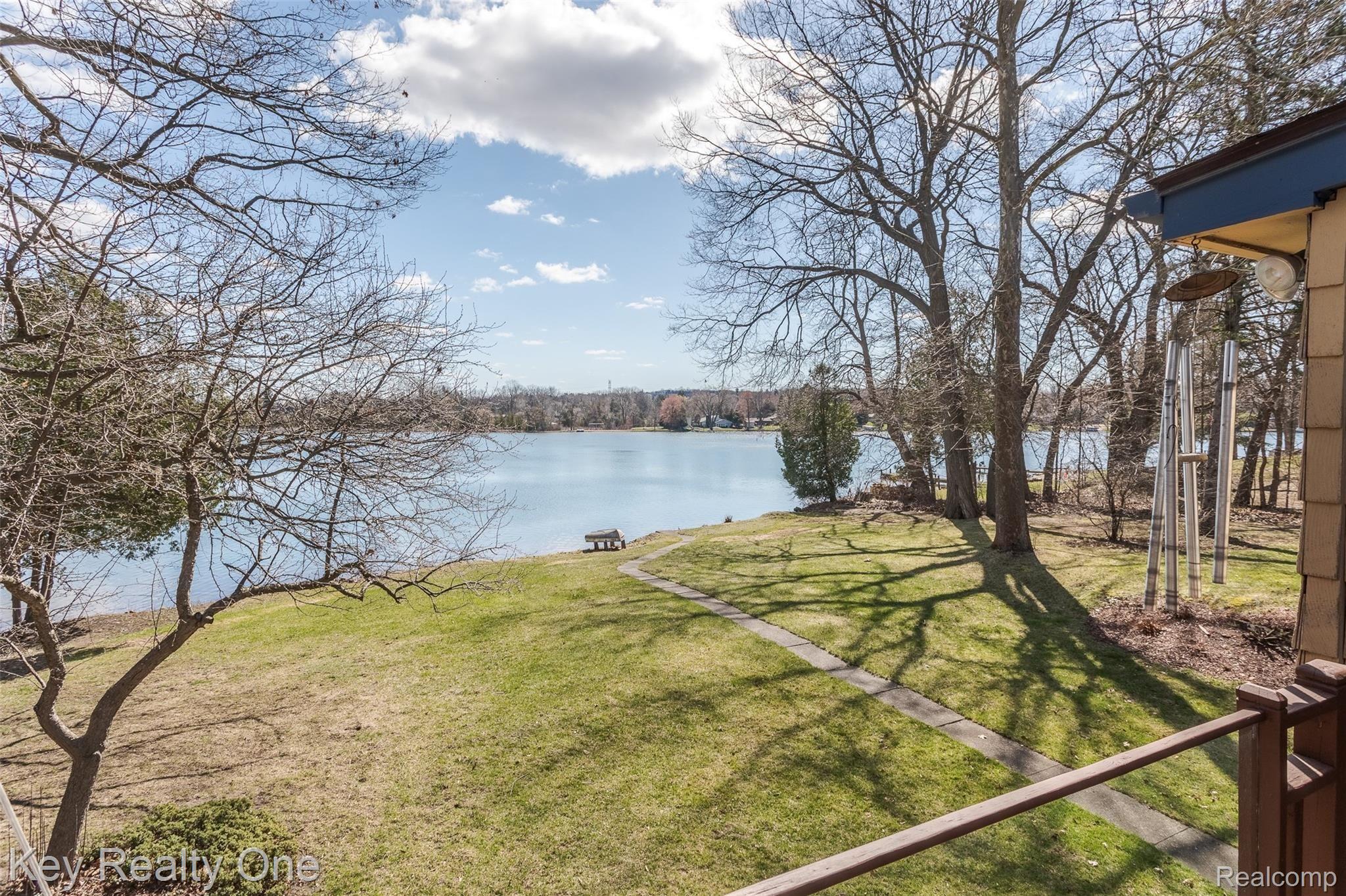 9720 Sashabaw Road Clarkston, MI 48348 - Photo 27 of 40 Back Yard Gently Slopes Down to the Water!