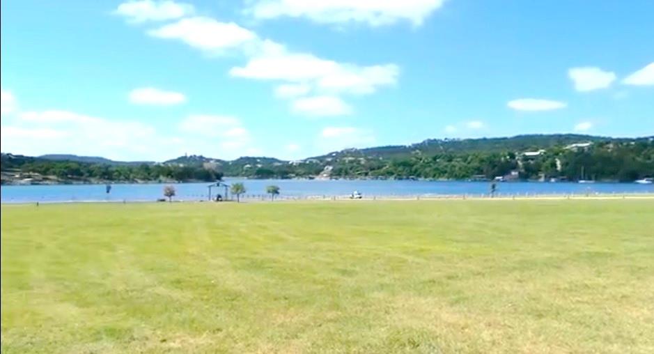 18311 Spring Lane Jonestown, TX 78645 - Photo 9 of 11 a view of a swimming pool and an outdoor seating