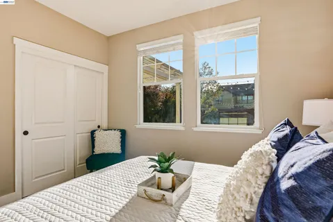 a view of a house with a yard porch and sitting area