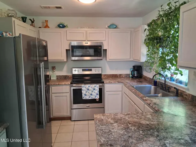 $400,000 | 9035 Pine Drive, Bay St. Louis, MS 39520