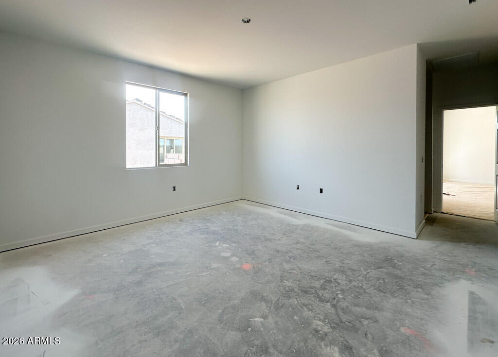 46953 North Dry Gulch Road Maricopa, AZ 85139 - Photo 6 of 16 an empty room with a window
