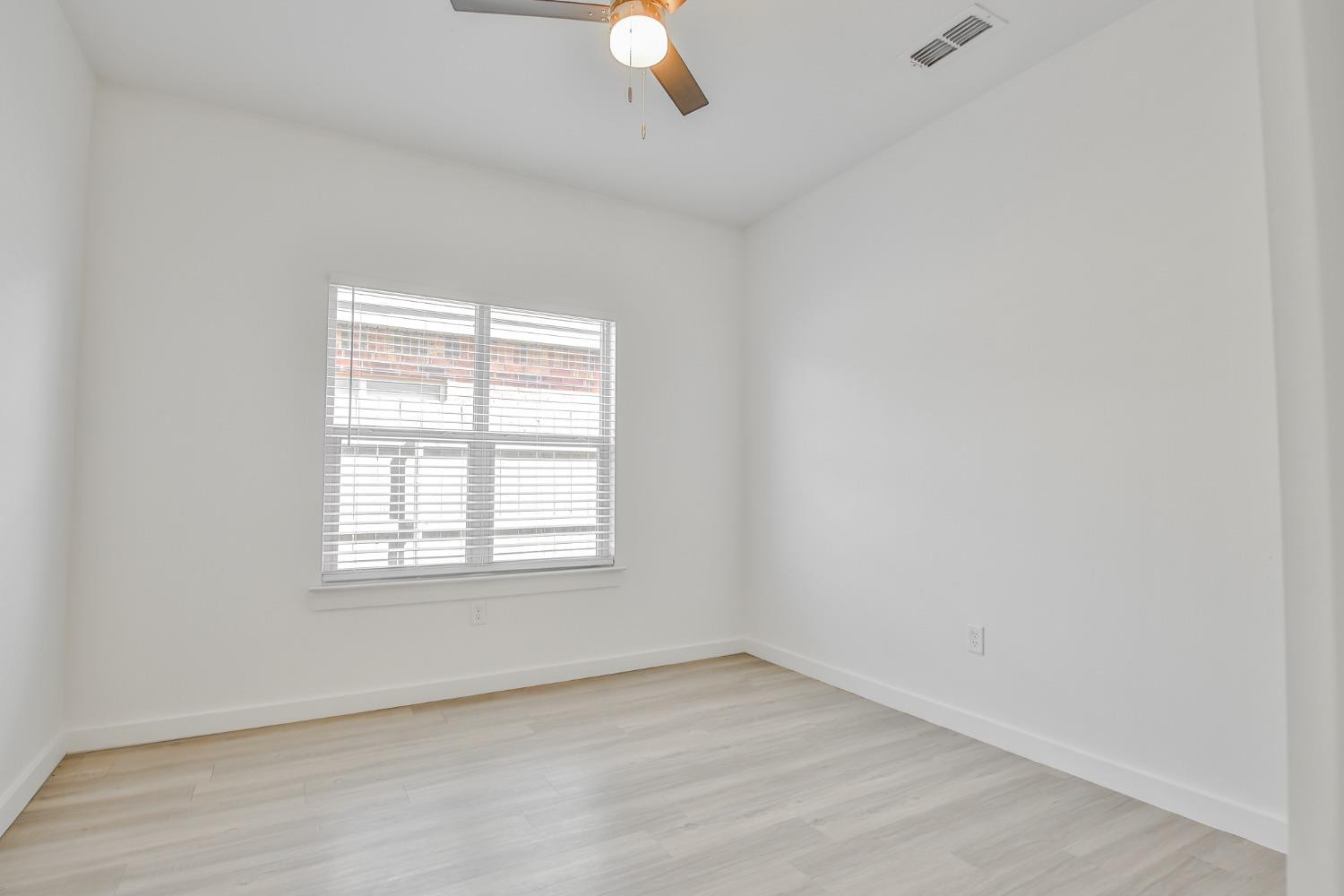 5508 Itasca Street Lubbock, TX 79416 - Photo 13 of 25 an empty room with a window