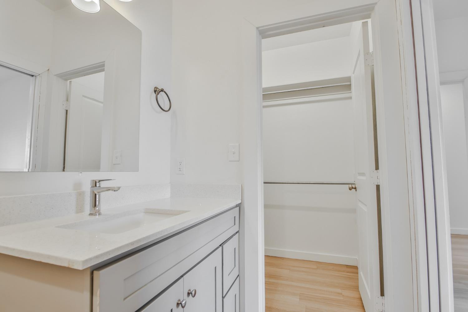 5508 Itasca Street Lubbock, TX 79416 - Photo 18 of 25 a bathroom with a sink and a mirror