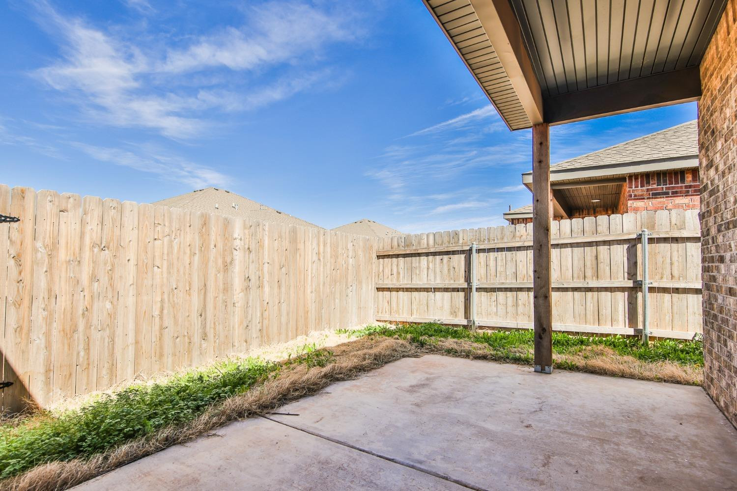 5508 Itasca Street Lubbock, TX 79416 - Photo 24 of 25 a view of a backyard with a garden