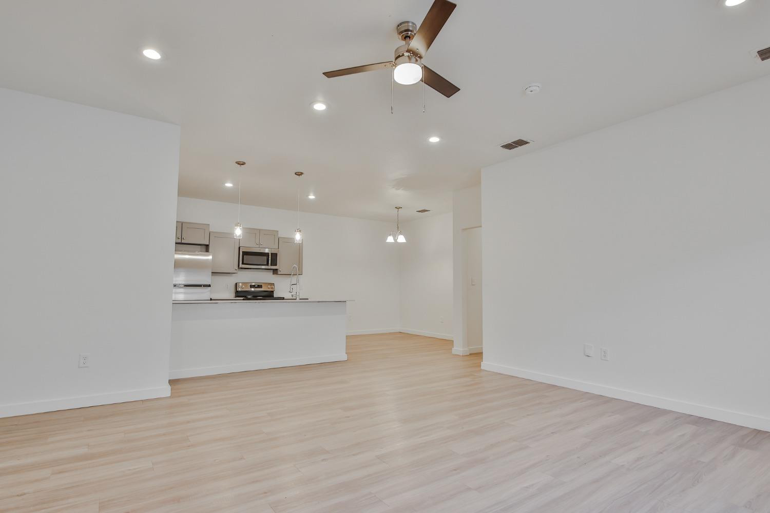 5508 Itasca Street Lubbock, TX 79416 - Photo 5 of 25 a view of kitchen and living room