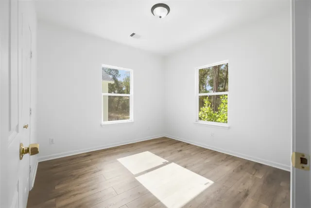 an empty room with windows