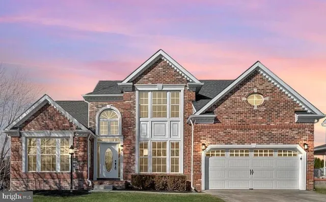 front view of a house with a street