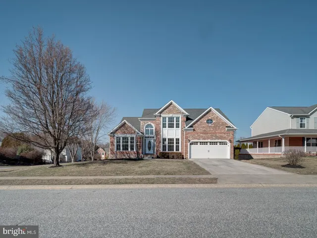 a front view of a house with a shower
