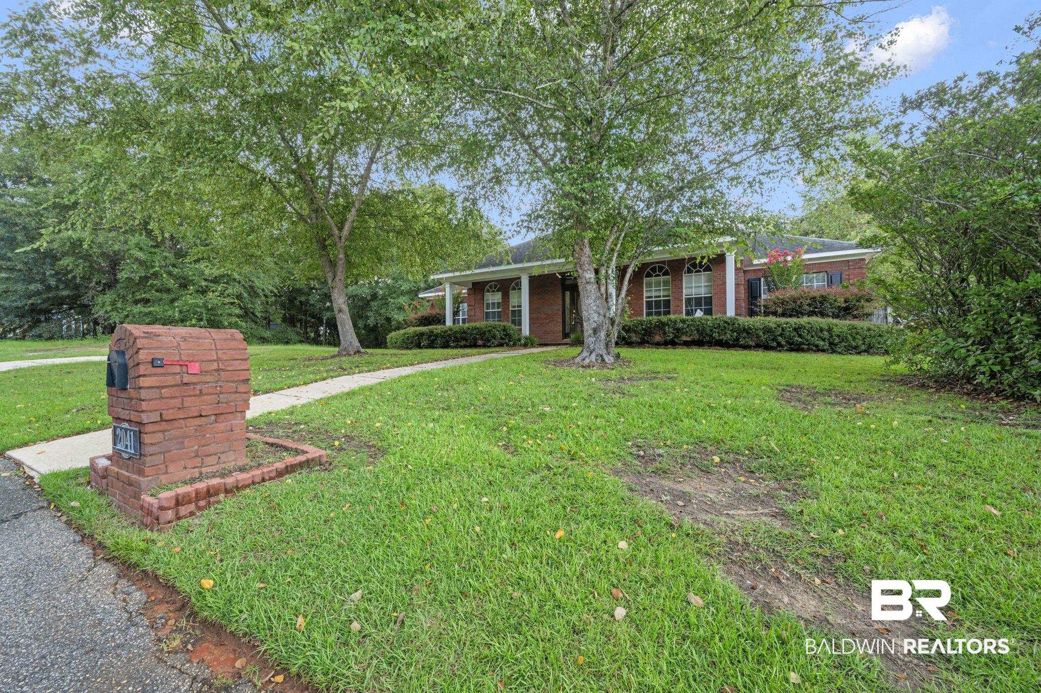 2041 Ridgeline Drive Mobile, AL 36695 - Photo 40 of 43 Ranch-style home with a front lawn