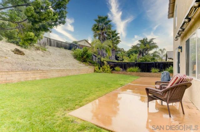 a view of a outdoor space with a table and chairs