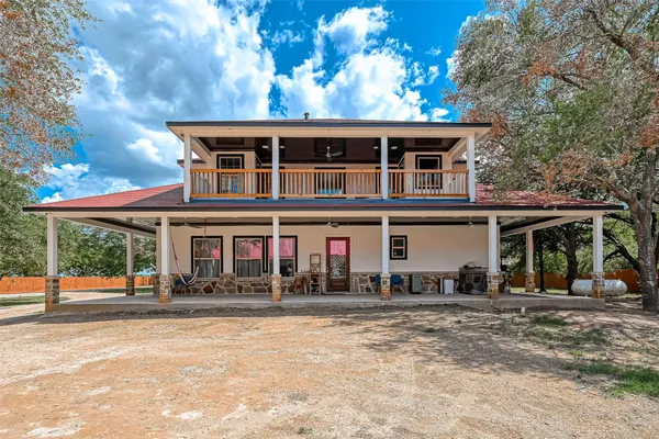a front view of a house with street