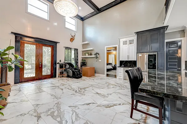 a view of a livingroom with furniture and windows
