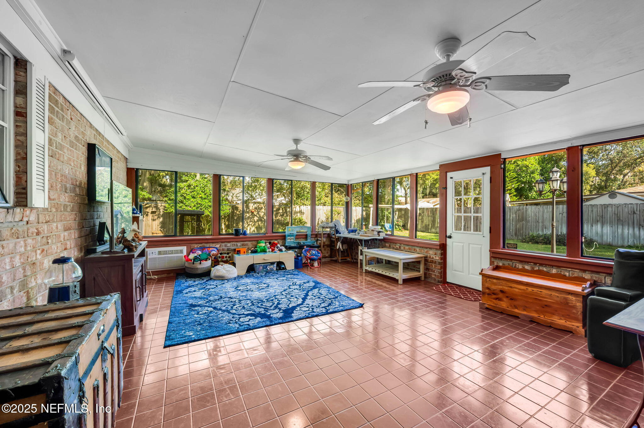 5495 Forrest Drive Orange Park, FL 32073 - Photo 16 of 34 a living room with furniture and a large window