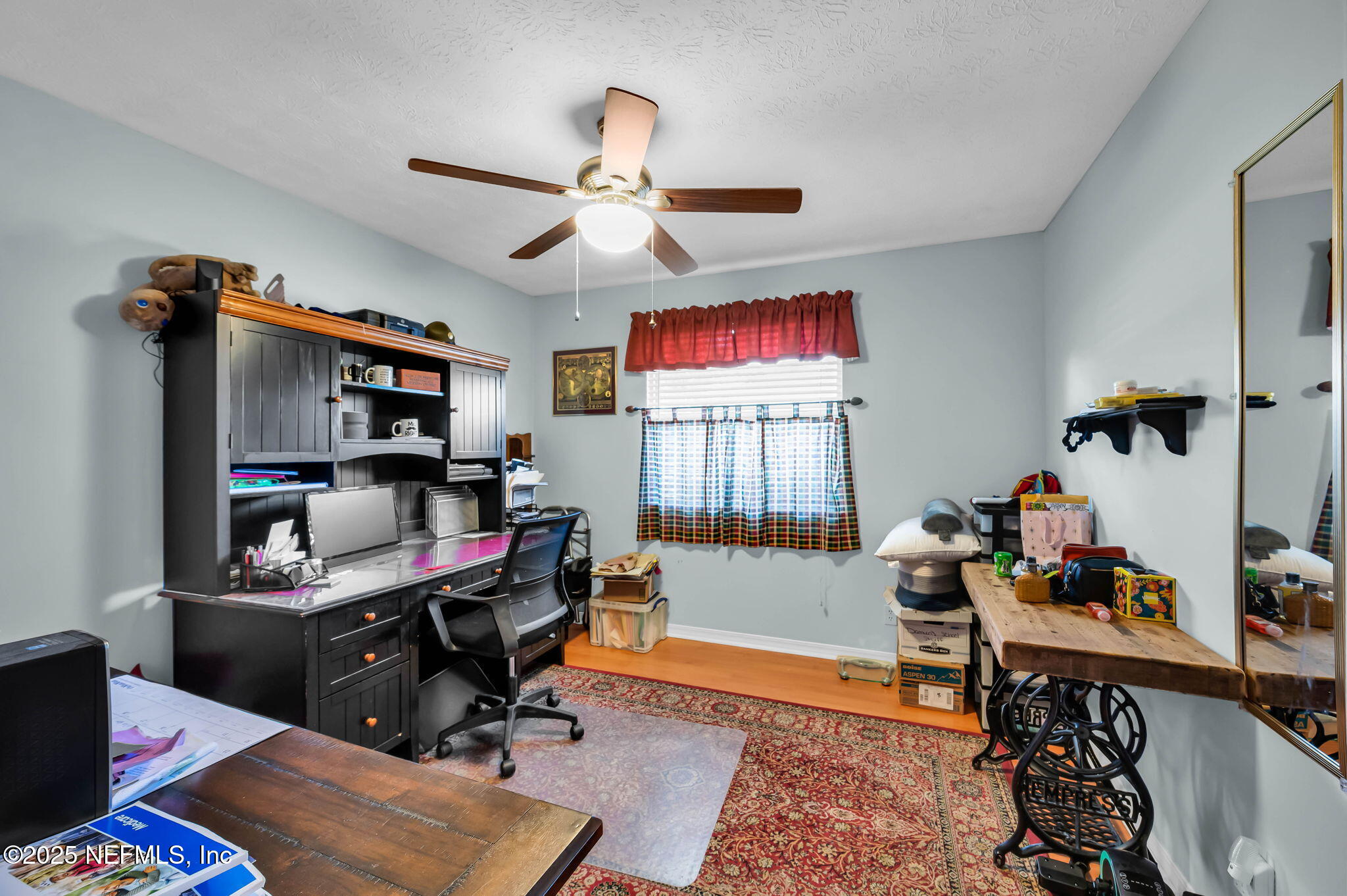 5495 Forrest Drive Orange Park, FL 32073 - Photo 23 of 34 a workspace with furniture and window