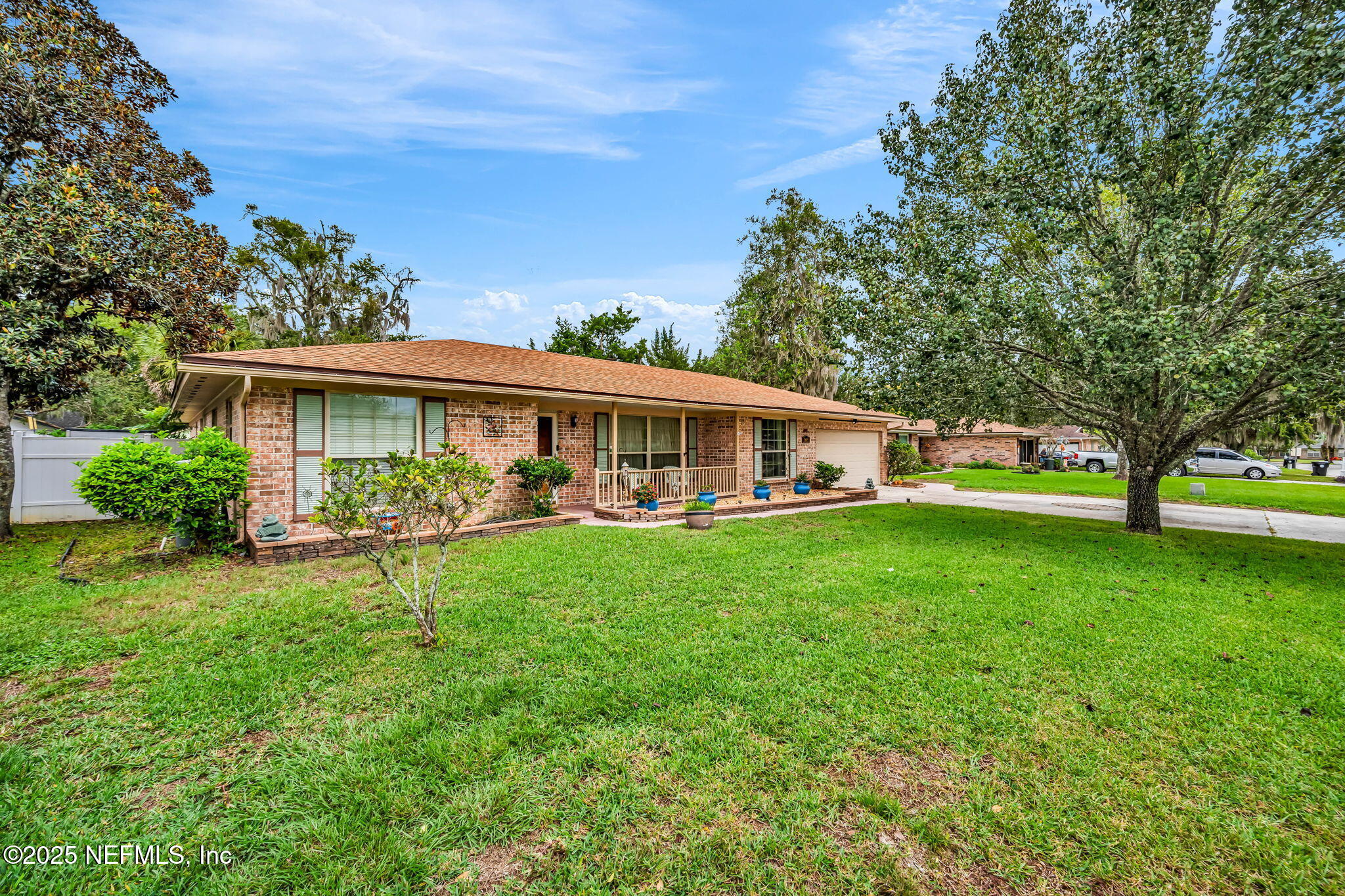 5495 Forrest Drive Orange Park, FL 32073 - Photo 3 of 34 a view of a house with a yard