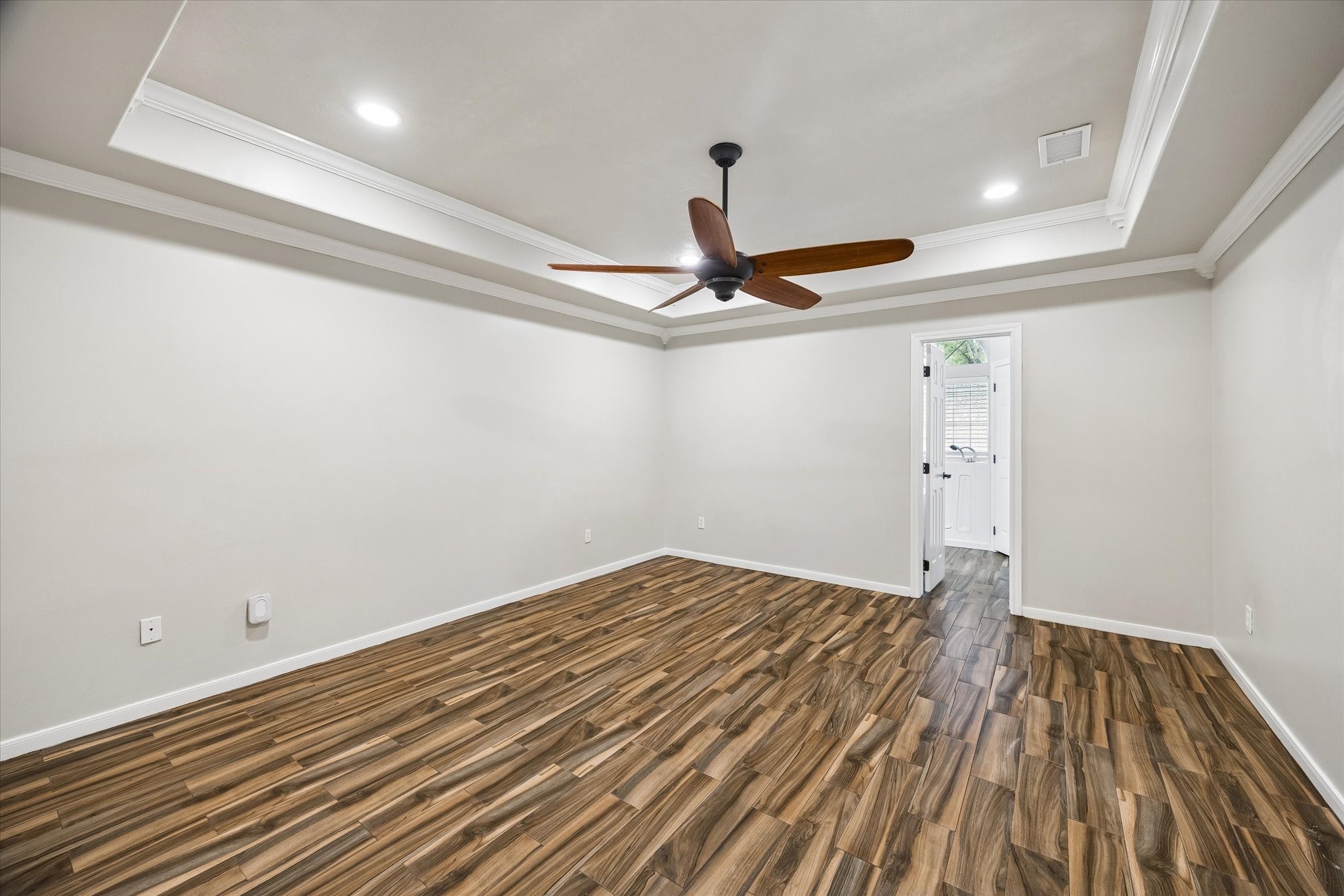 109 Dawns Edge Conroe, TX 77356 - Photo 11 of 24 a view of a room with wooden floor