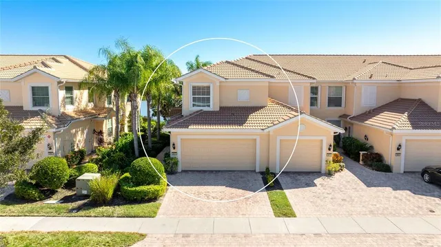 an aerial view of a house with outdoor space