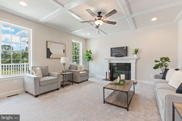 a bathroom with a sink double vanity granite tub shower and a mirror