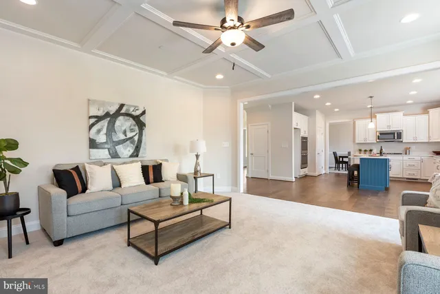 a bedroom with a bed a window and couch