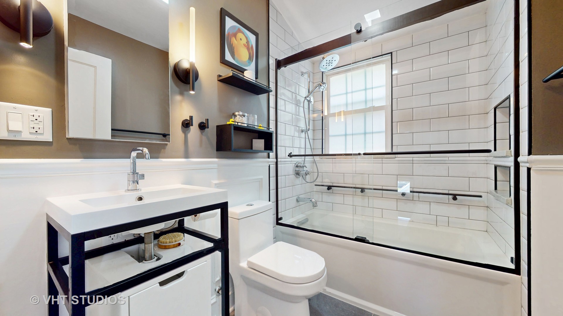 4627 Wolf Road Western Springs, IL 60558 - Photo 17 of 30 a bathroom with a sink toilet and a mirror
