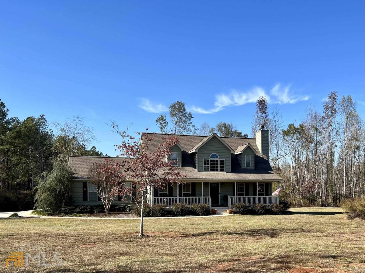 1300 Crawley Road Madison, GA 30650 - Photo 1 of 1 a front view of a house with a yard