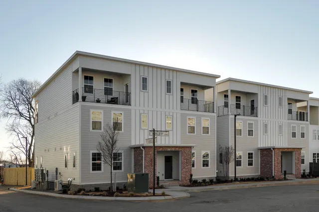 a front view of a building with a street