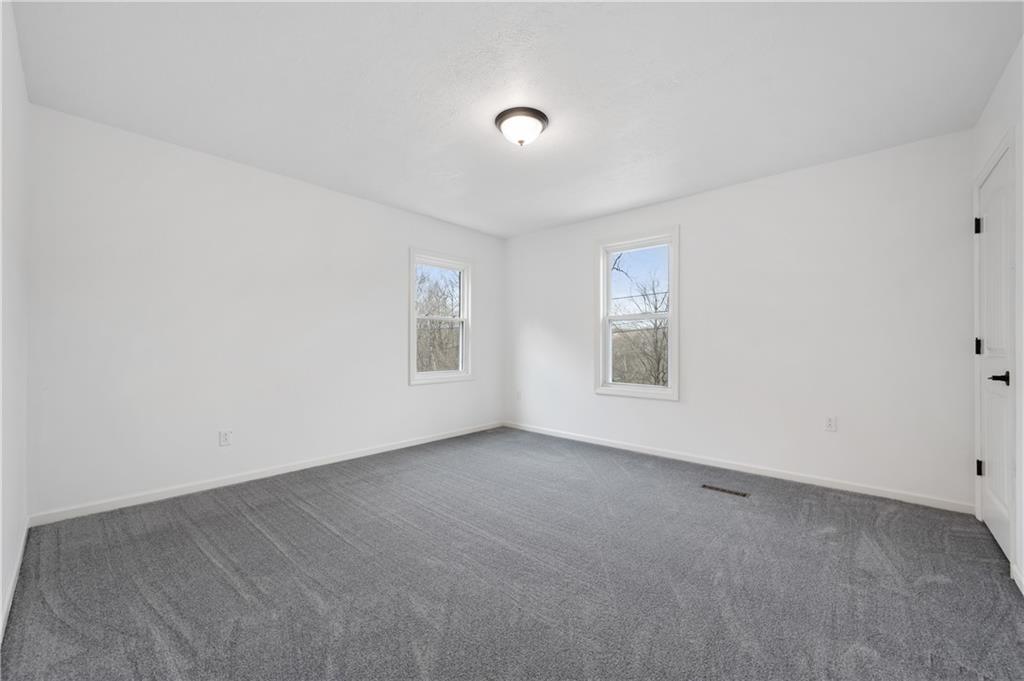 215 Wendel Road Irwin, PA 15642 - Photo 23 of 25 an empty room with windows and closet