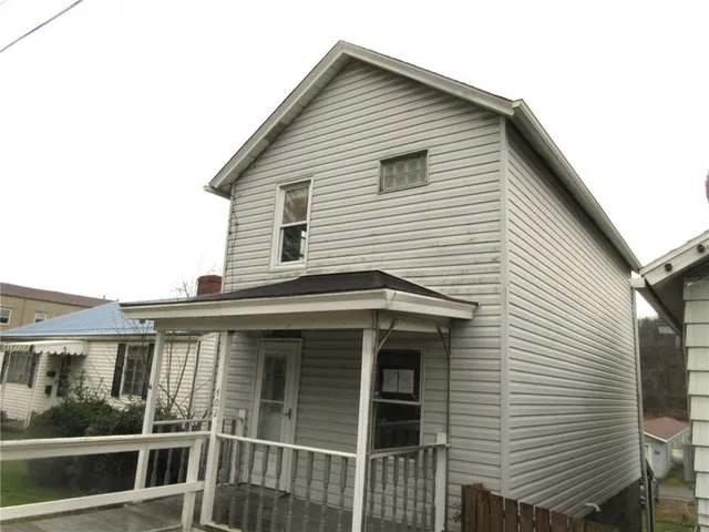 a view of a house with a balcony
